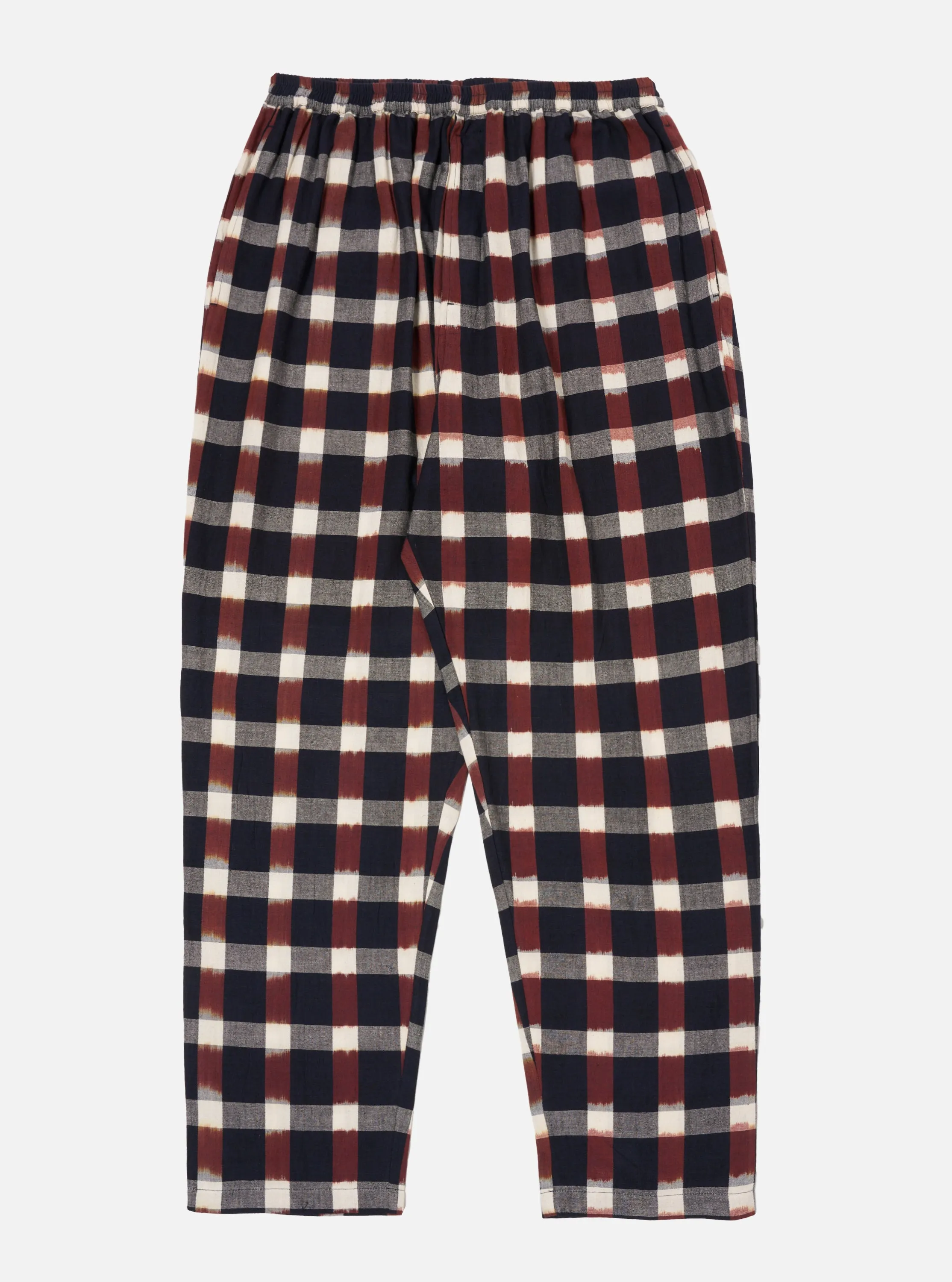 Universal Works Pyjama Pant in Indigo Ikat Check sold by Universal Works