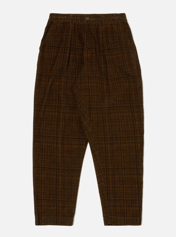 Universal Works Pleated Track Pant in Brown Check Cord Seersucker sold by Universal Works