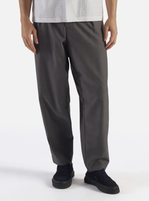 Universal Works Pleated Track Pant in Grey Marl Tropical Suiting sold by Universal Works