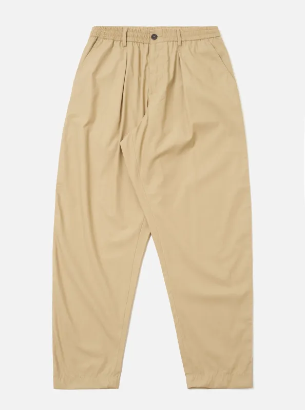Sand Recycled Polytech Pleated Track Pant sold by Universal Works