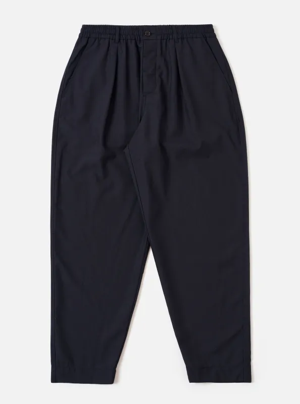 Navy Tropical Suiting Pleated Track Pant sold by Universal Works