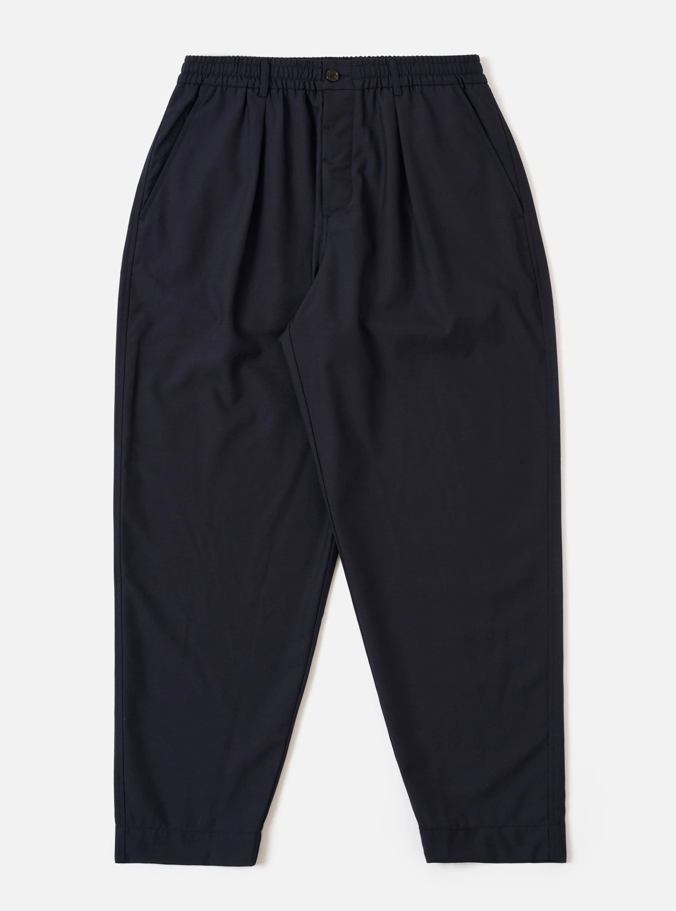 Navy Tropical Suiting Pleated Track Pant sold by Universal Works