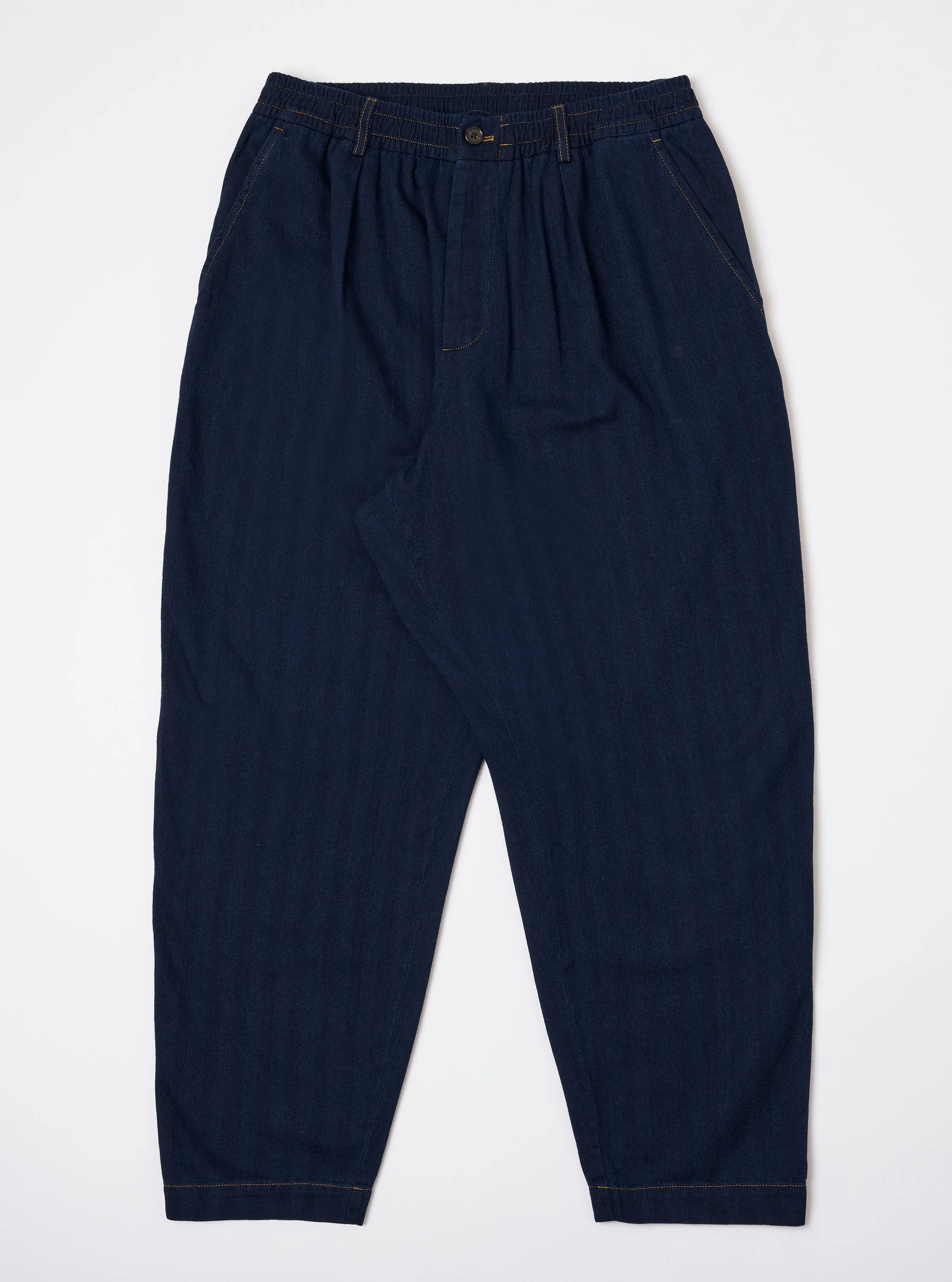 Indigo Recycled Herringbone Pleated Track Pant sold by Universal Works