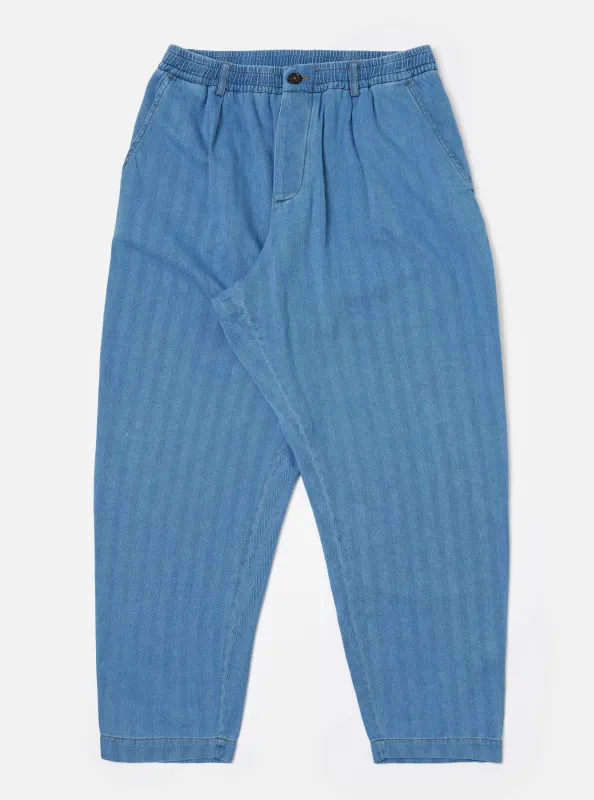 Washed Indigo Recycled Herringbone Pleated Track Pant sold by Universal Works