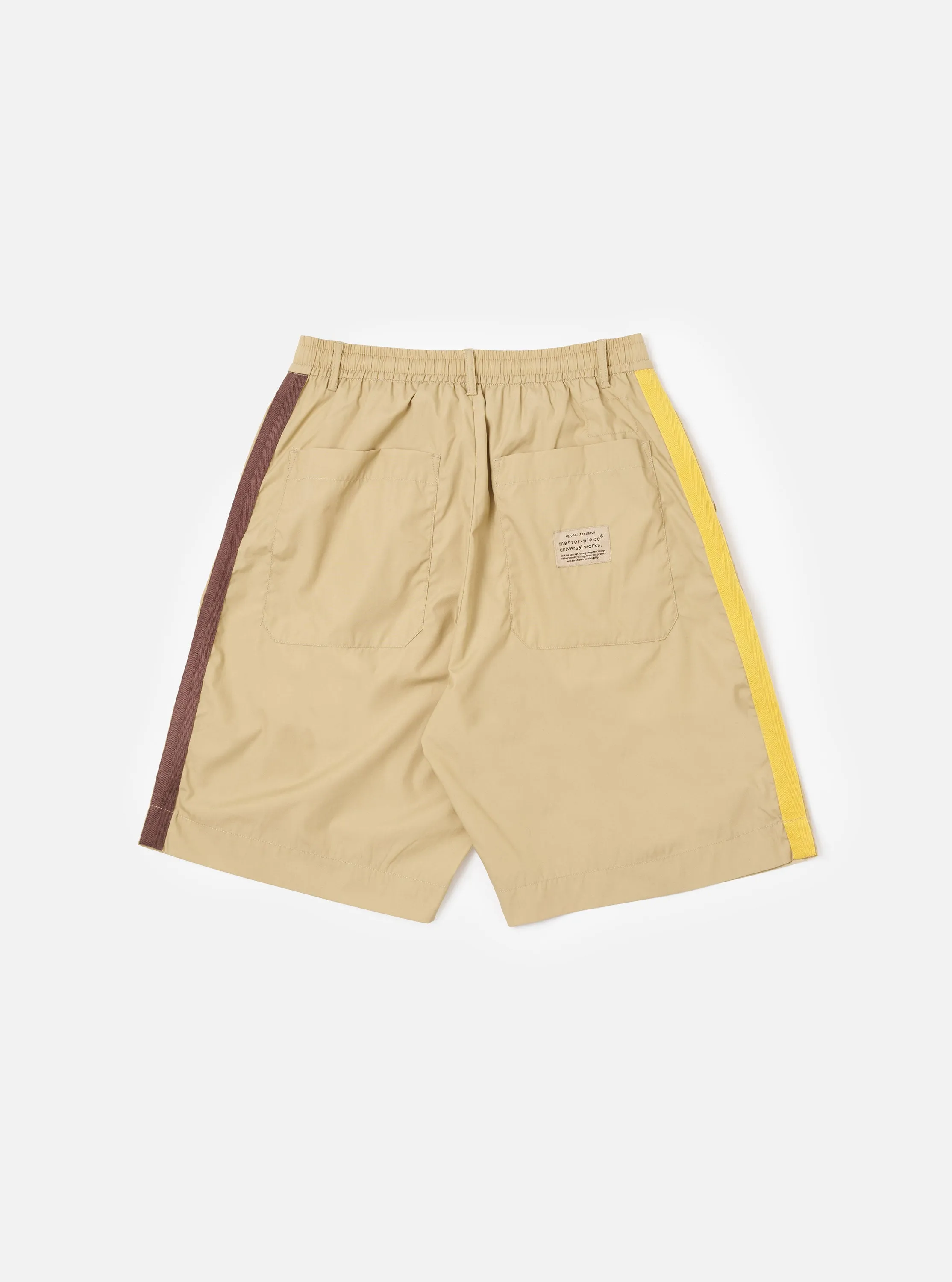 master-piece x Universal Works Sand Recycled Polytech Pleated Track Short sold by Universal Works product image thumbnail 5