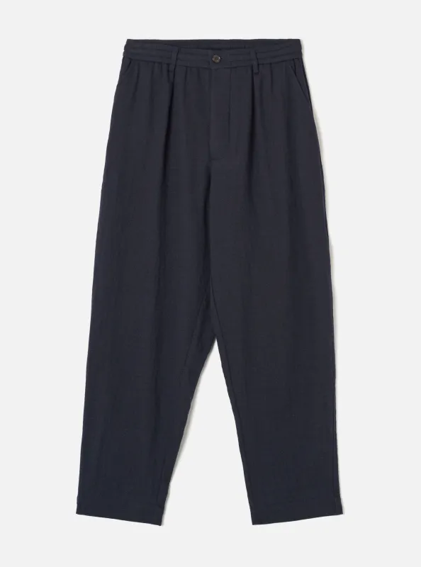 Dark Navy Robin Wool Mix Pleated Track Pant made by Universal Works