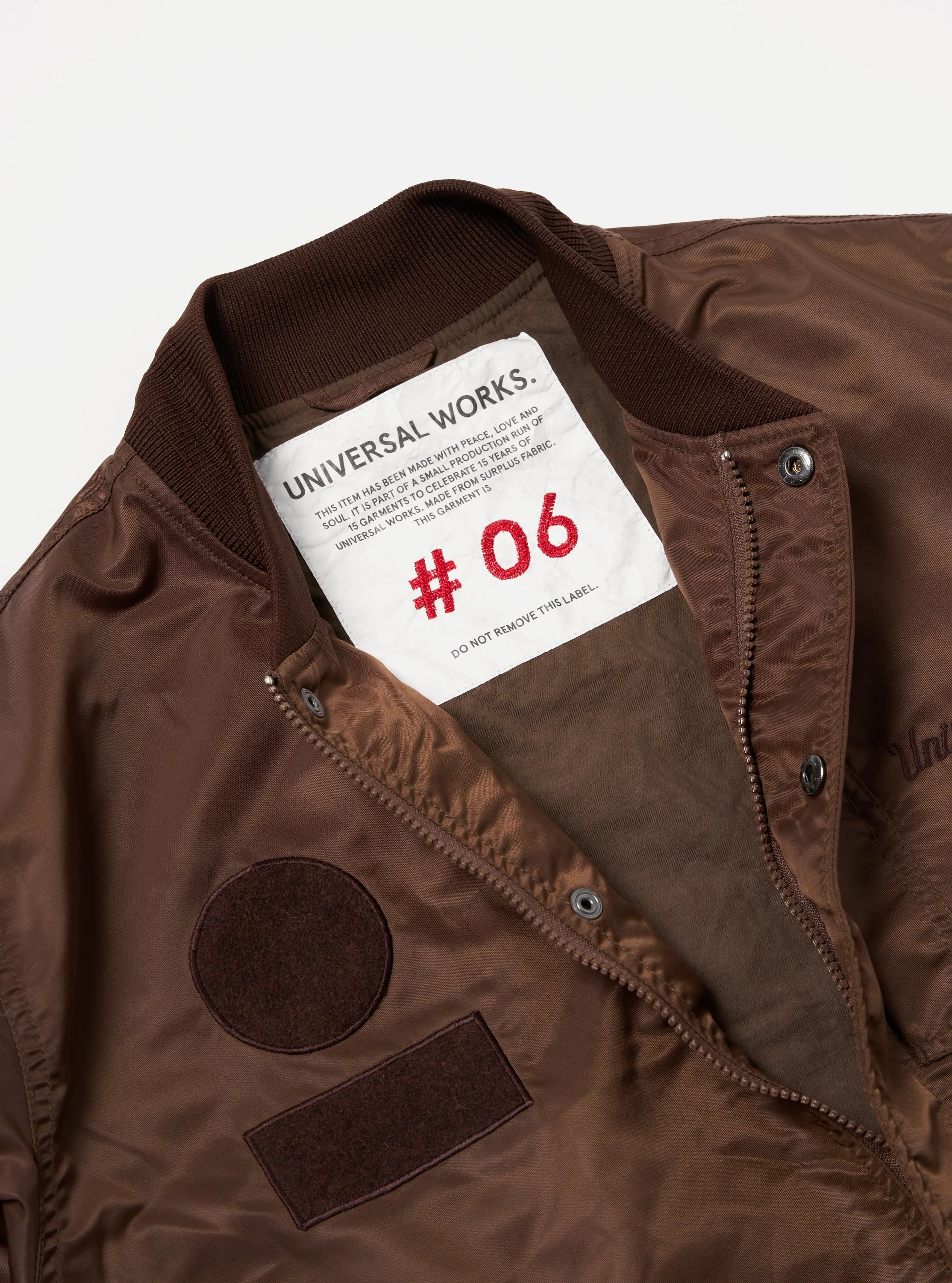 Universal Works Badge Bomber in Brown Flight Nylon sold by Universal Works product image thumbnail 3