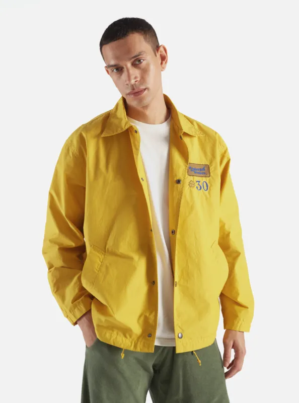 Universal Works Embroidered Head Coach Jacket in Yellow Halley Ripstop sold by Universal Works