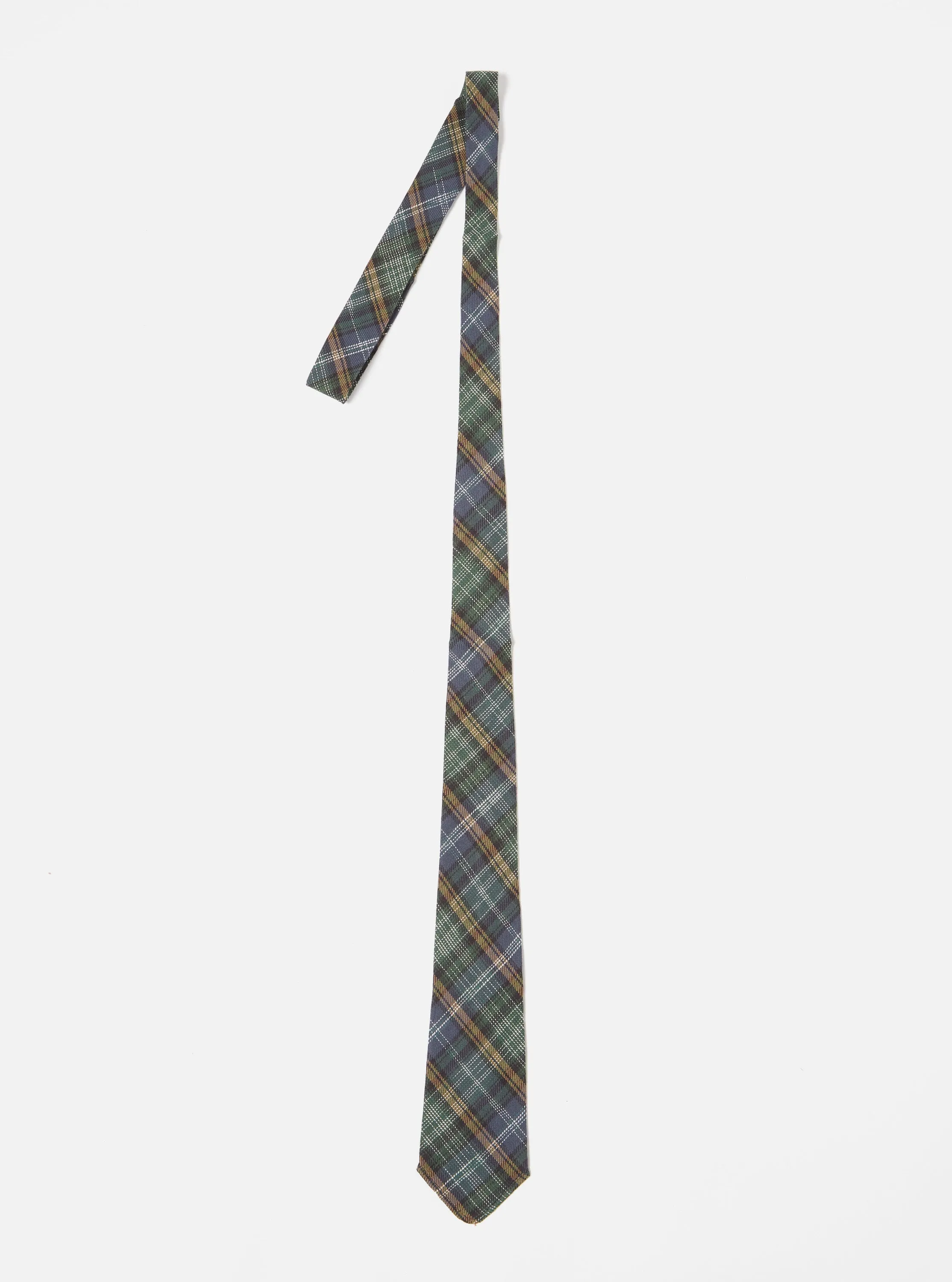 Universal Works Tie in Green Ikat Twill Check sold by Universal Works