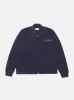 Universal Works Oxford Bomber Jacket in Navy Dry Handle Brushback sold by Universal Works