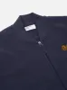 Universal Works Oxford Bomber Jacket in Navy Dry Handle Brushback sold by Universal Works