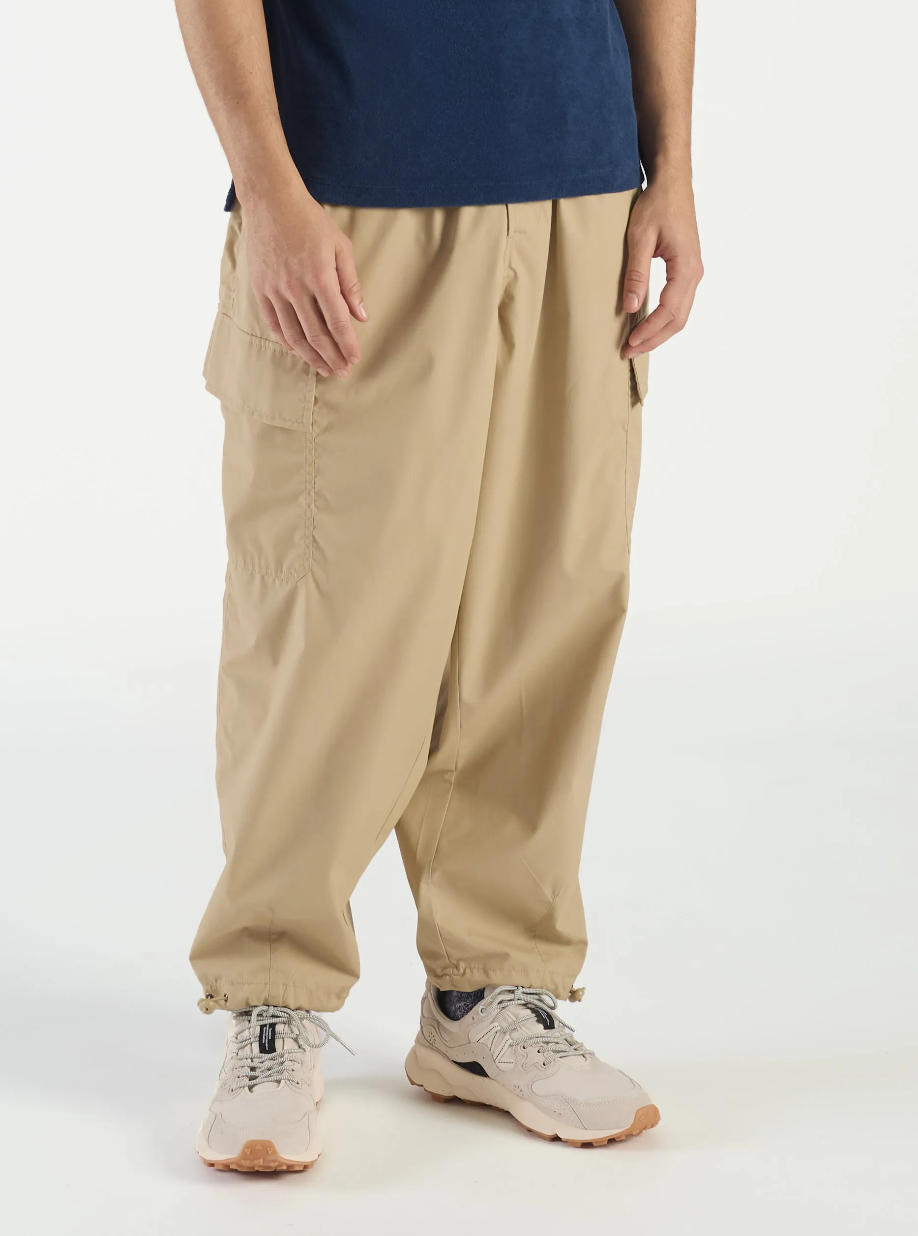 Universal Works Loose Cargo Pant in Sand Recycled Poly Tech sold by Universal Works