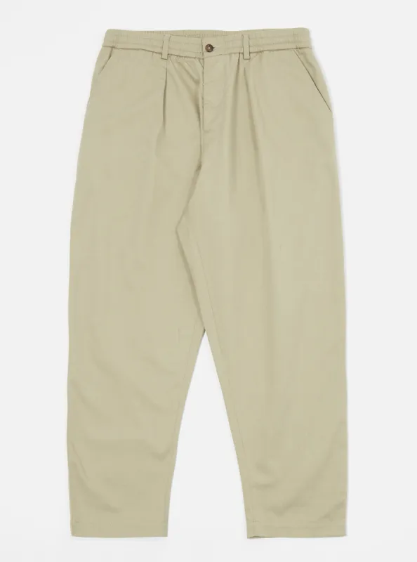 Universal Works Pleated Track Pant in Stone Twill sold by Universal Works