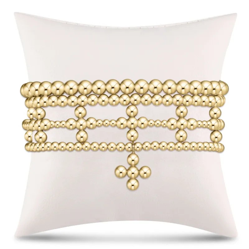 Meaningful Signature Cross Gold Stack of 4 sold by enewton