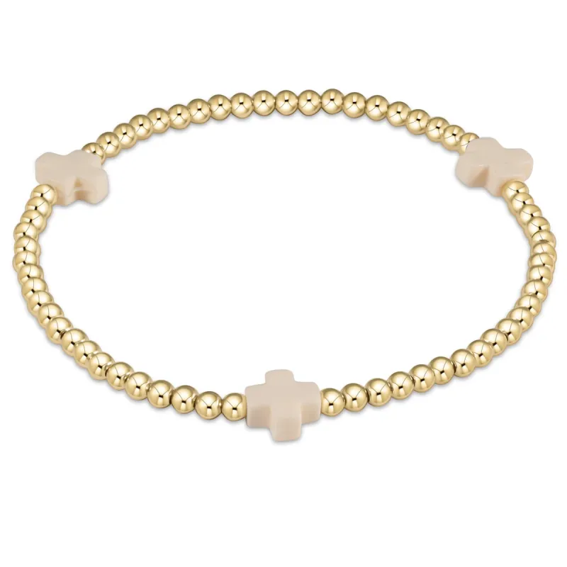 signature cross gold pattern 3mm bead bracelet sold by enewton
