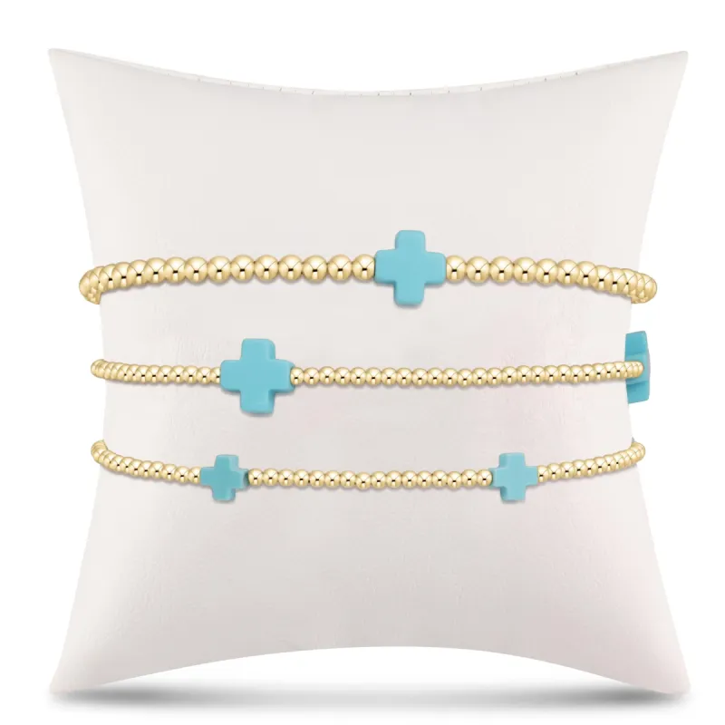 signature cross stack - turquoise sold by enewton