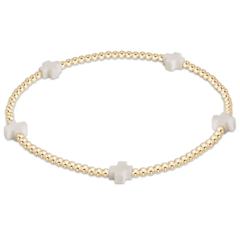 Signature Cross Small Gold Pattern 2mm Bead Bracelet sold by enewton