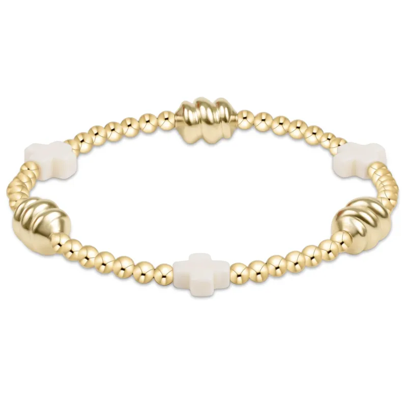 Signature Cross Admire Gold Pattern 3mm Bead Bracelet - Off-White sold by enewton