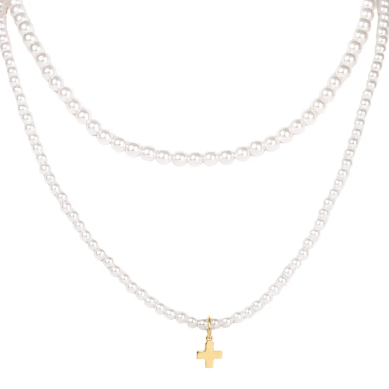 layers with meaning - pearl signature cross charm sold by enewton