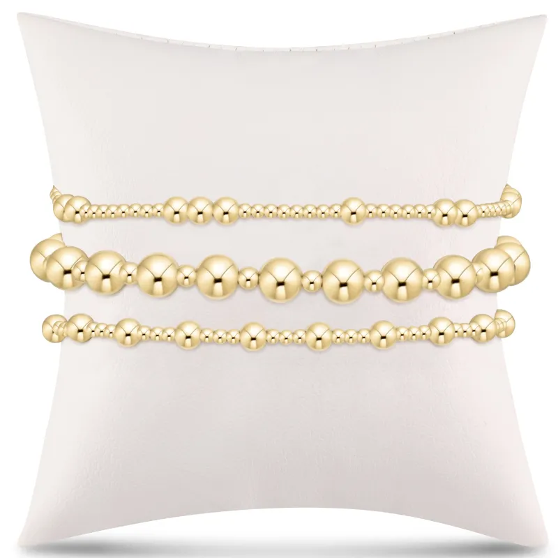 elevate the everyday gift stack - gold sold by enewton