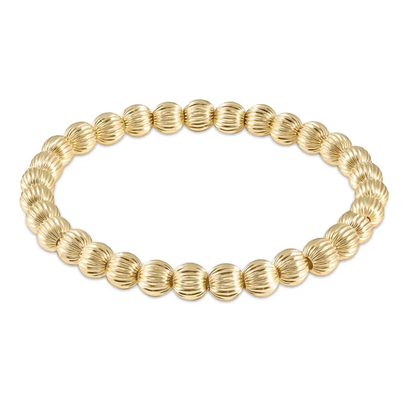 Dignity Gold 6mm Bead Bracelet sold by enewton