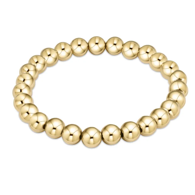 classic gold 7mm bead bracelet sold by enewton