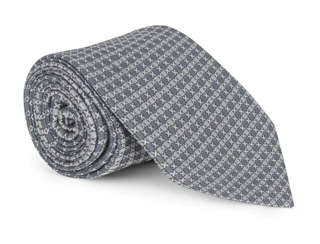Yates Silver Semi Solid Tie sold by Mountain & Sackett