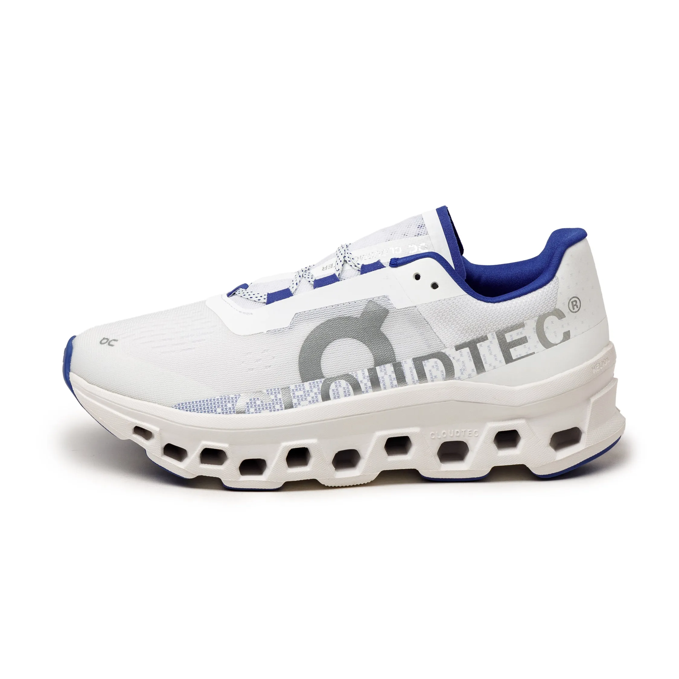 On Cloudmonster *Year of the Dragon* sold by Asphalt Gold