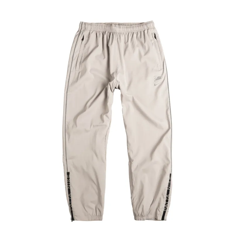 Nike x Patta Running Team Track Pants sold by Asphalt Gold