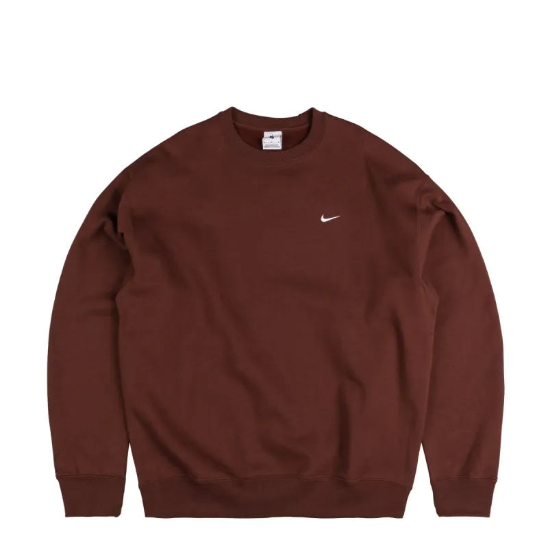 Nike	Solo Swoosh Crewneck sold by Asphalt Gold