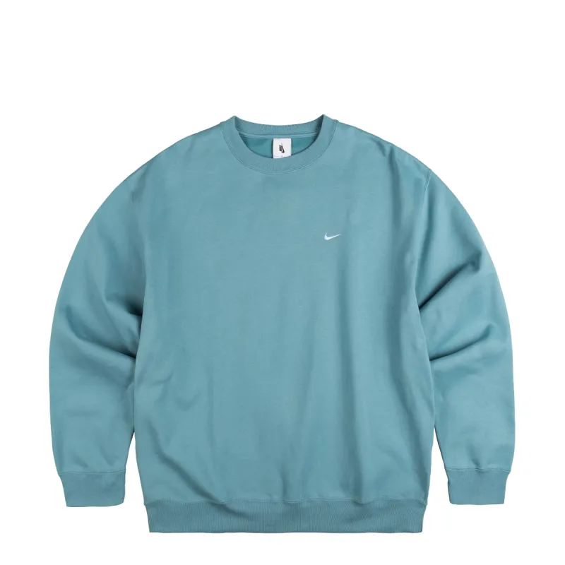 Nike	Solo Swoosh Crewneck sold by Asphalt Gold