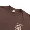 Sporty & Rich Crest Seal 100th T Shirt sold by Asphalt Gold