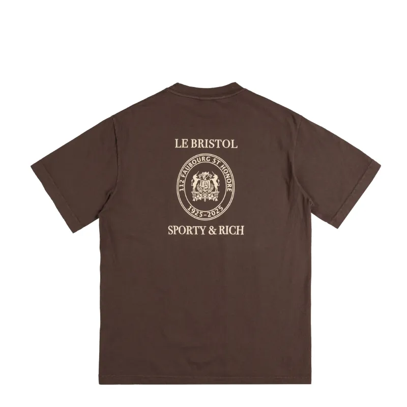 Sporty & Rich Crest Seal 100th T Shirt sold by Asphalt Gold