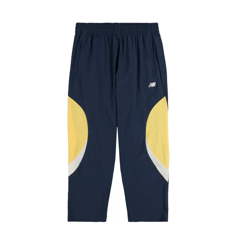 New Balance In Game Woven Track Pant sold by Asphalt Gold