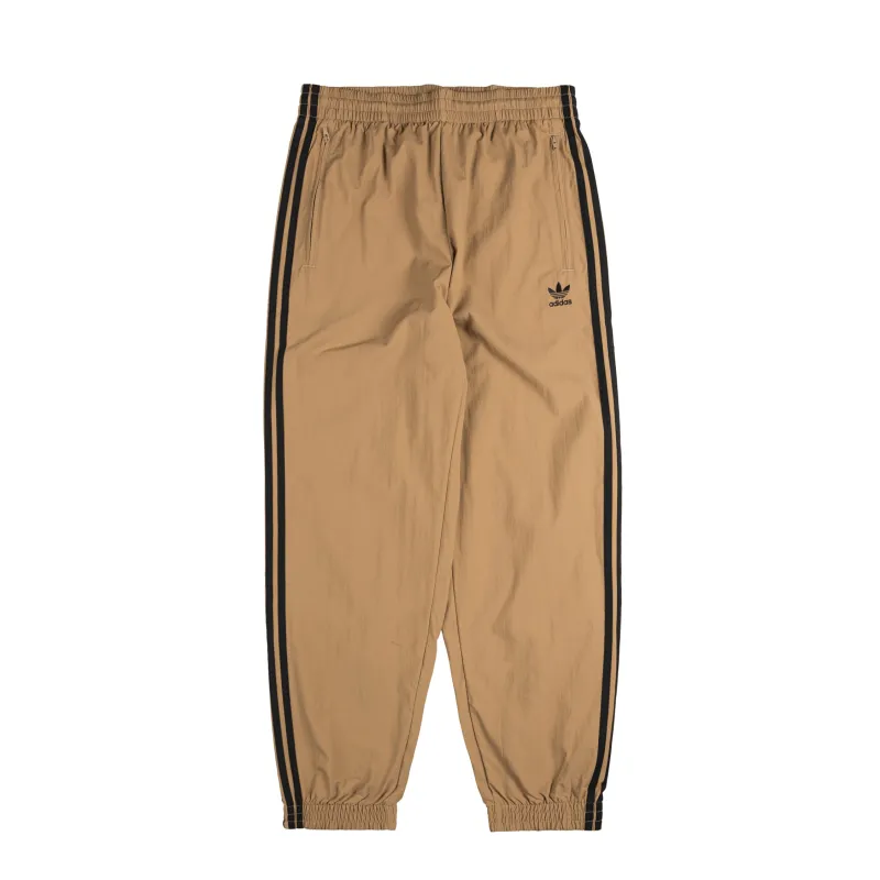 Adidas Woven Firebird Track Pants sold by Asphalt Gold