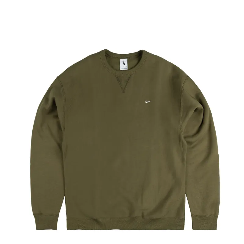 Nike	Solo Swoosh Fleece Crewneck sold by Asphalt Gold