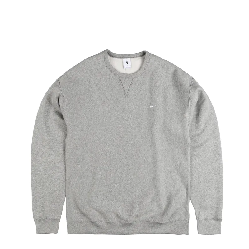 Nike	Solo Swoosh Fleece Crewneck sold by Asphalt Gold