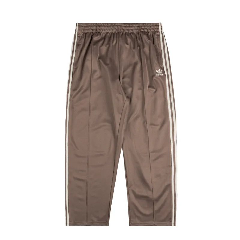 Adidas Adicolor Baggy Fit Firebird Trackpants sold by Asphalt Gold