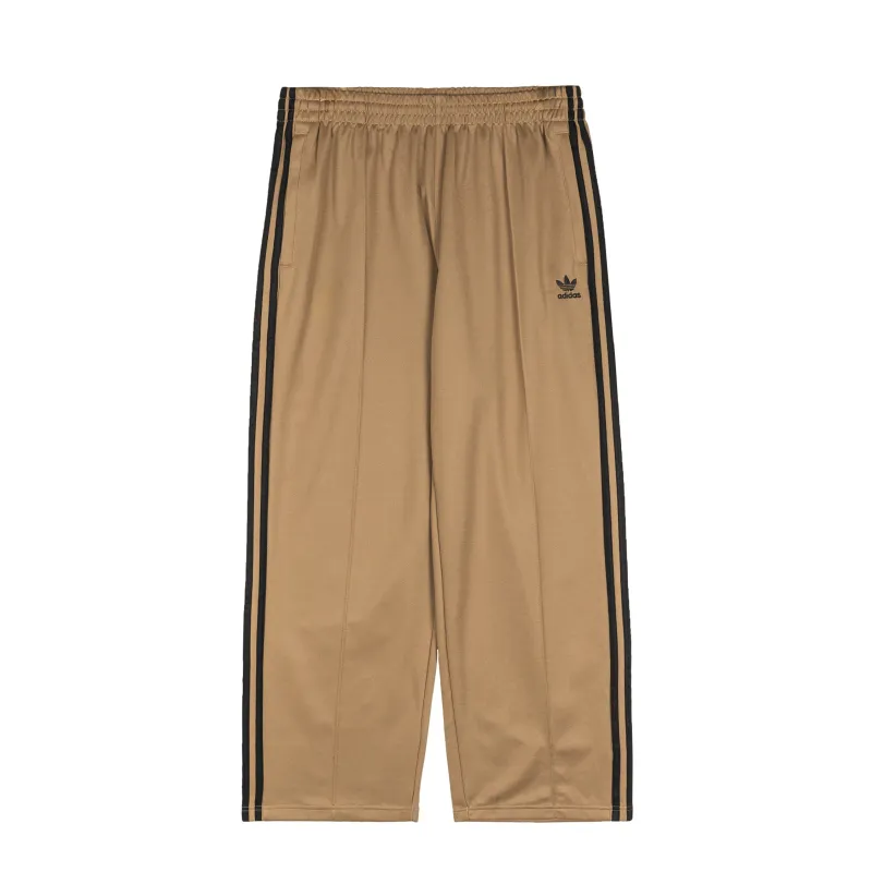 Adidas Adicolor Baggy Fit Firebird Trackpants sold by Asphalt Gold