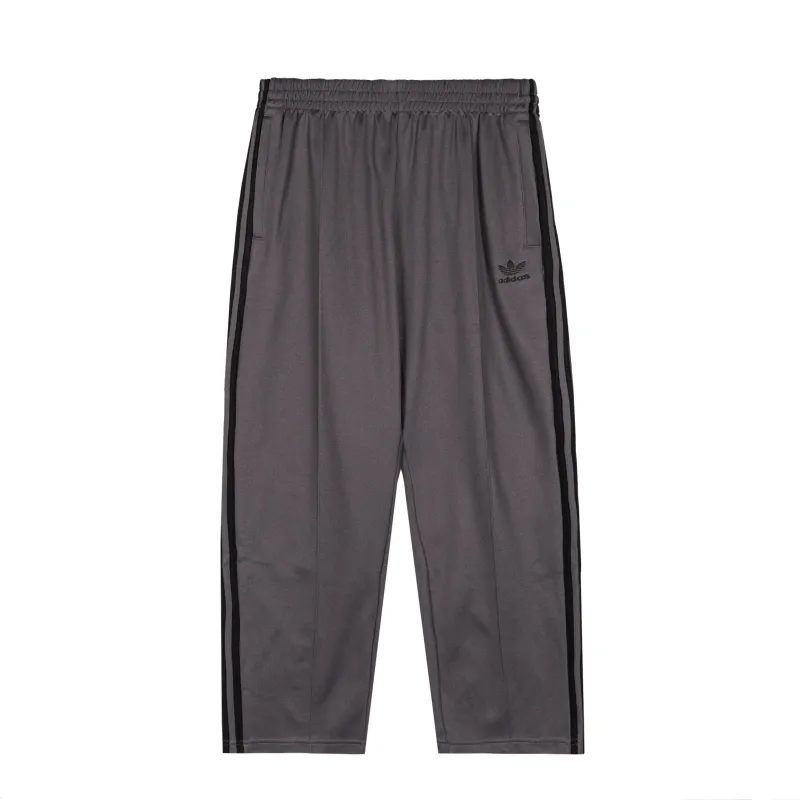 Adidas Adicolor Baggy Fit Firebird Trackpants sold by Asphalt Gold