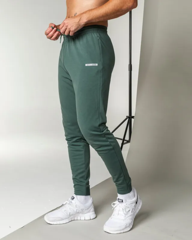 Legacy Training Tapered Joggers - Olive Smoke sold by Muscle Nation