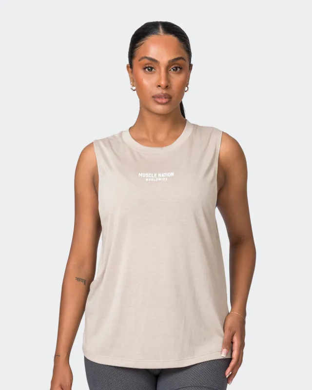 Worldwide Drop Arm Tank - Bone sold by Muscle Nation