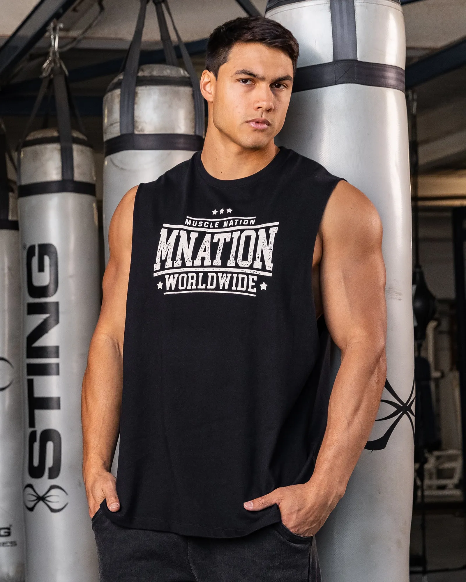 Undefeated Drop Arm Tank - Black sold by Muscle Nation