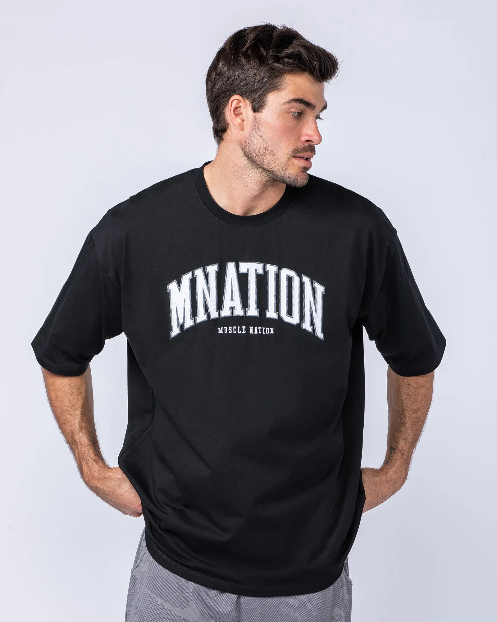 MN Varsity Oversized Tee - Black sold by Muscle Nation