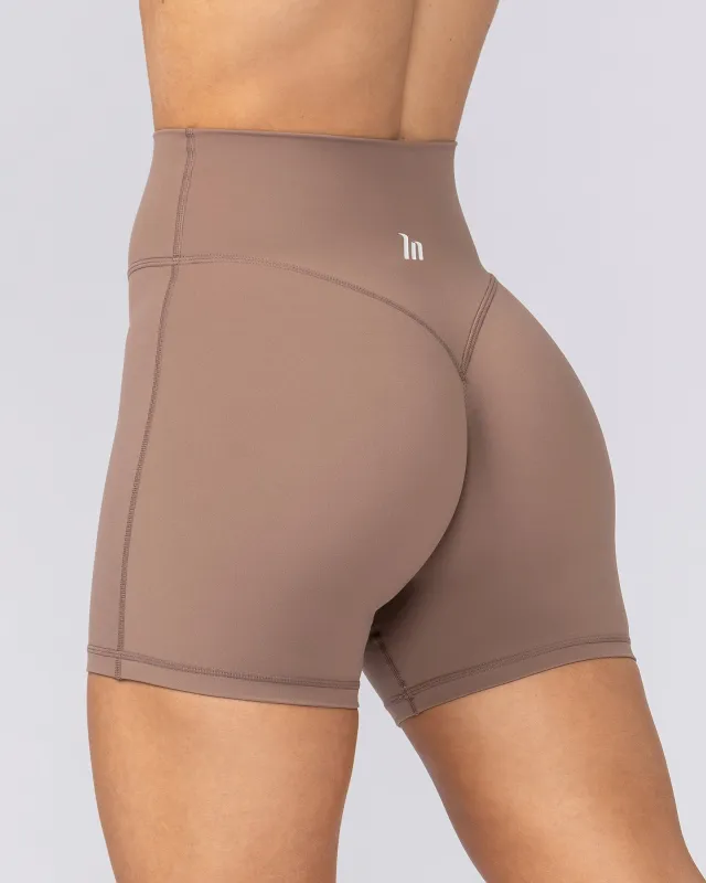 Aura Peachy Invisible Scrunch Midway Shorts - Cookie sold by Muscle Nation