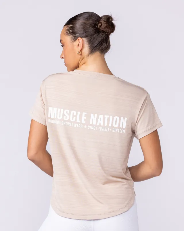 Ignite Training Tee - Sand sold by Muscle Nation