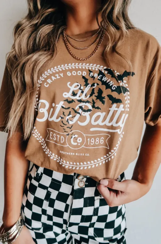 Lil Bit Batty Graphic Tee – Funny Halloween Shirt for Women sold by Alley and Rae