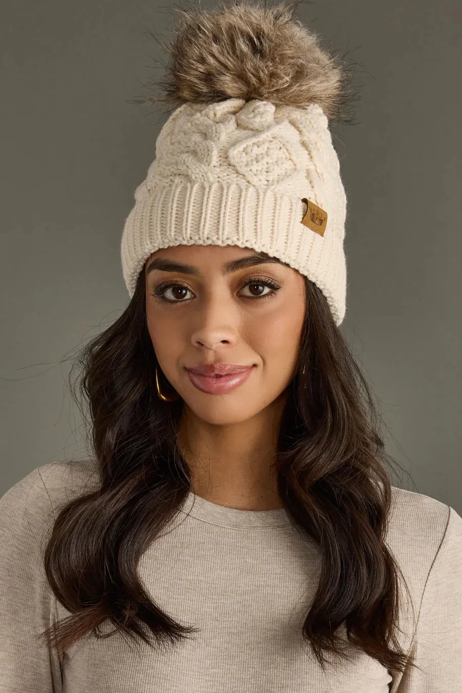 Beige Cable Knit Pom Beanie – Winter Hat with Faux Fur Pom | Holiday Gift sold by Alley and Rae