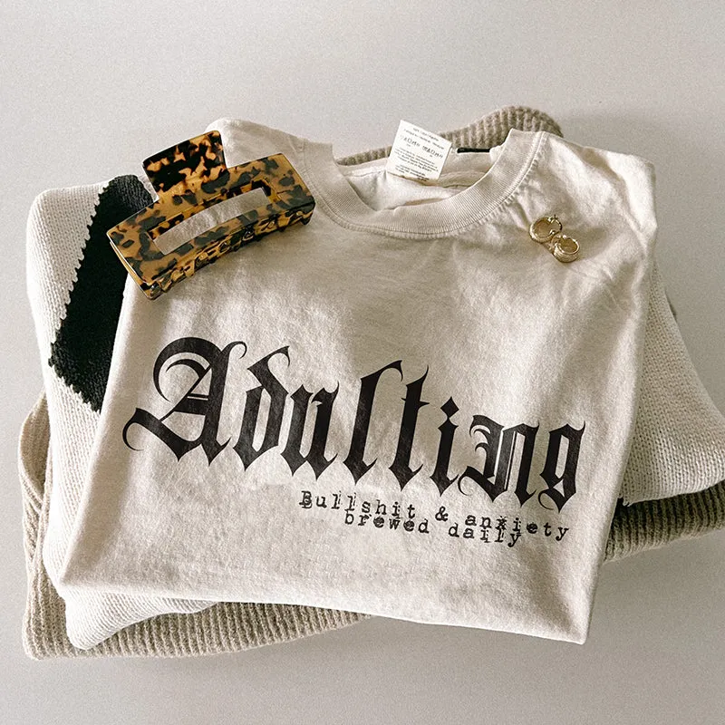 Adulting Heavyweight Tee sold by Alley and Rae