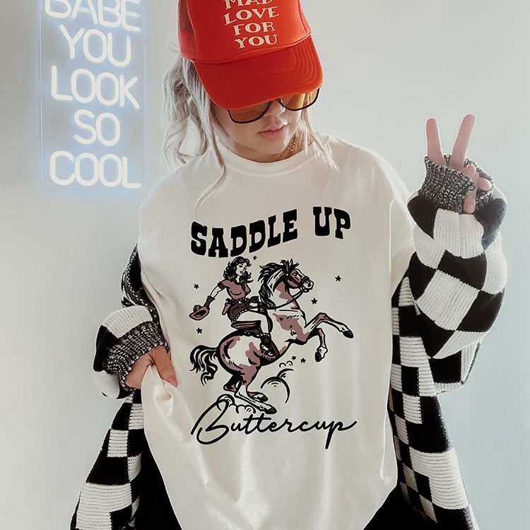 Saddle Up Buttercup Western Graphic Tee (Wholesale) sold by Ally and Rae